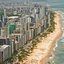 Boa viagem visto de cima com diversos prédios e a praia na lateral