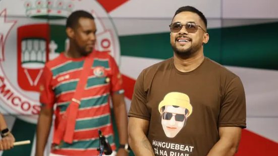 Fernando Frazão/Agência Brasil.
					
					
					Mestre Fafá e a bateria da escola de samba Acadêmicos do Grande Rio durante participação no programa Sem Censura, da TV Brasil