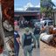 Fios de cobre em sacolas. Policiais militares com agentes da prefeitura. Caminhão com vários fios de cobre