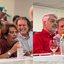 Montagem de 2 fotos. Luciano Bivar sorri ao lado de Carlos Veras. Foto 2 Luciano Bivar fala com Humberto Costa