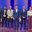 Juntos em pé 4 homens de terno e uma mulher ao lado de João Campos, Raquel Lyra e Ivan Moraes
