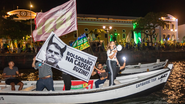 Visita de Flávio Bolsonaro teve caminhada pelo Recife Antigo e contraponto de apoiadores de Lula nas águas do Capibaribe