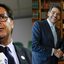 Gilson Machado Neto fala ao microfone; Jorge Messias aperta mão de Lula
